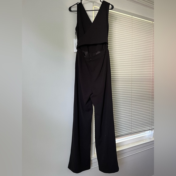 **sold elsewhere** Calvin Klein size 10 black cut out Jumpsuit with tie waist - Picture 4 of 8